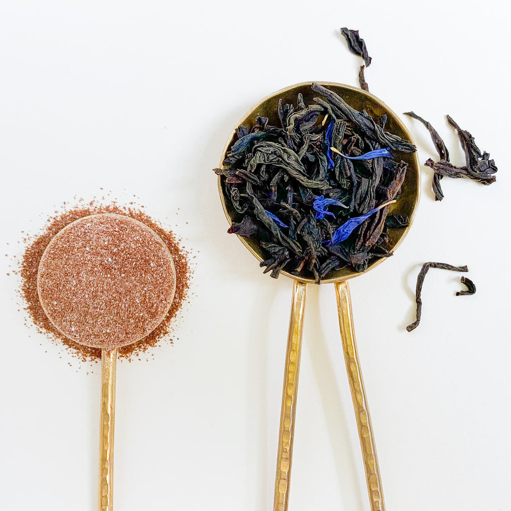 Scoop of Microground Tea and Loose Leaf Tea